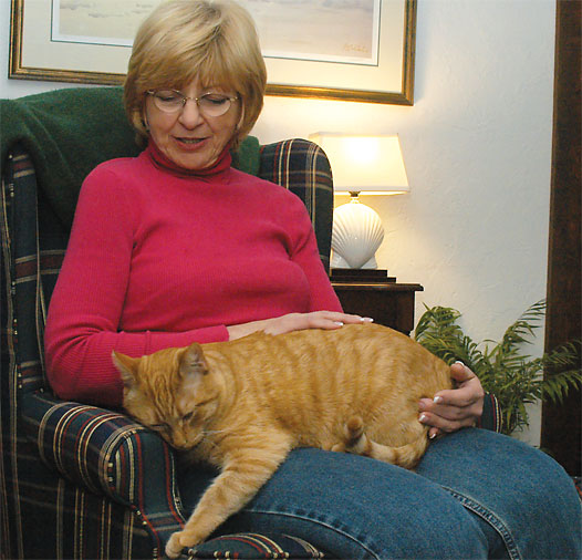 Sandy Springer with cat